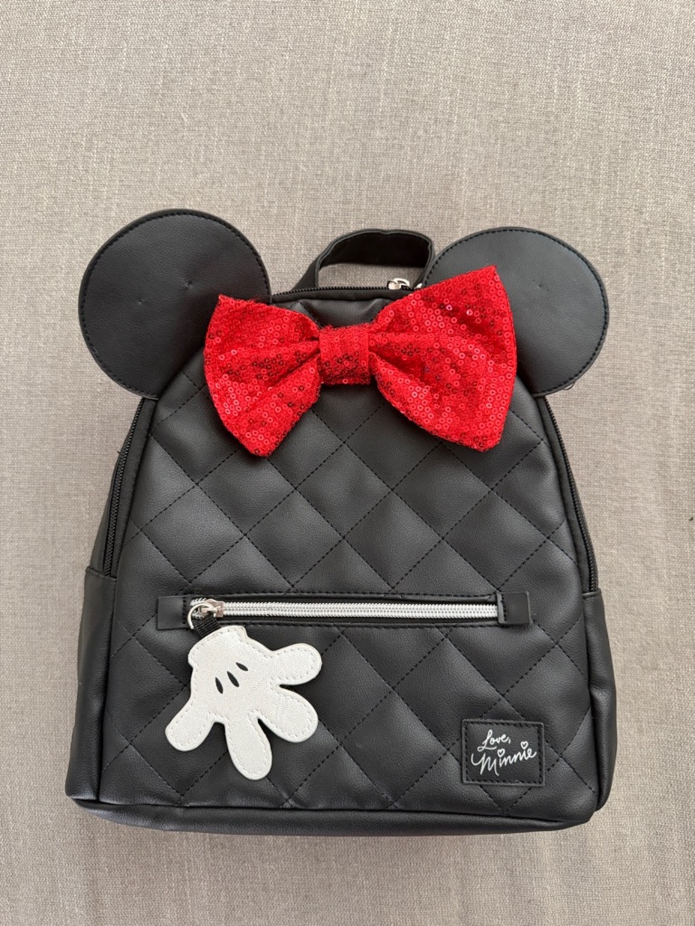 Black quilted Minnie Mouse backpack